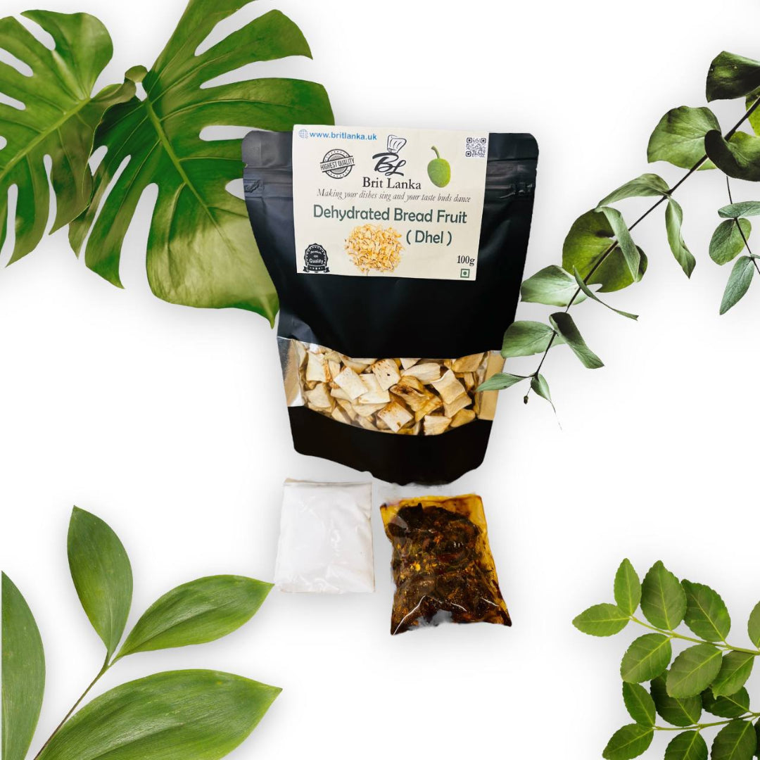 Packaging of dehydrated Ceylon organic breadfruit with spices and milk powder, surrounded by green leaves.