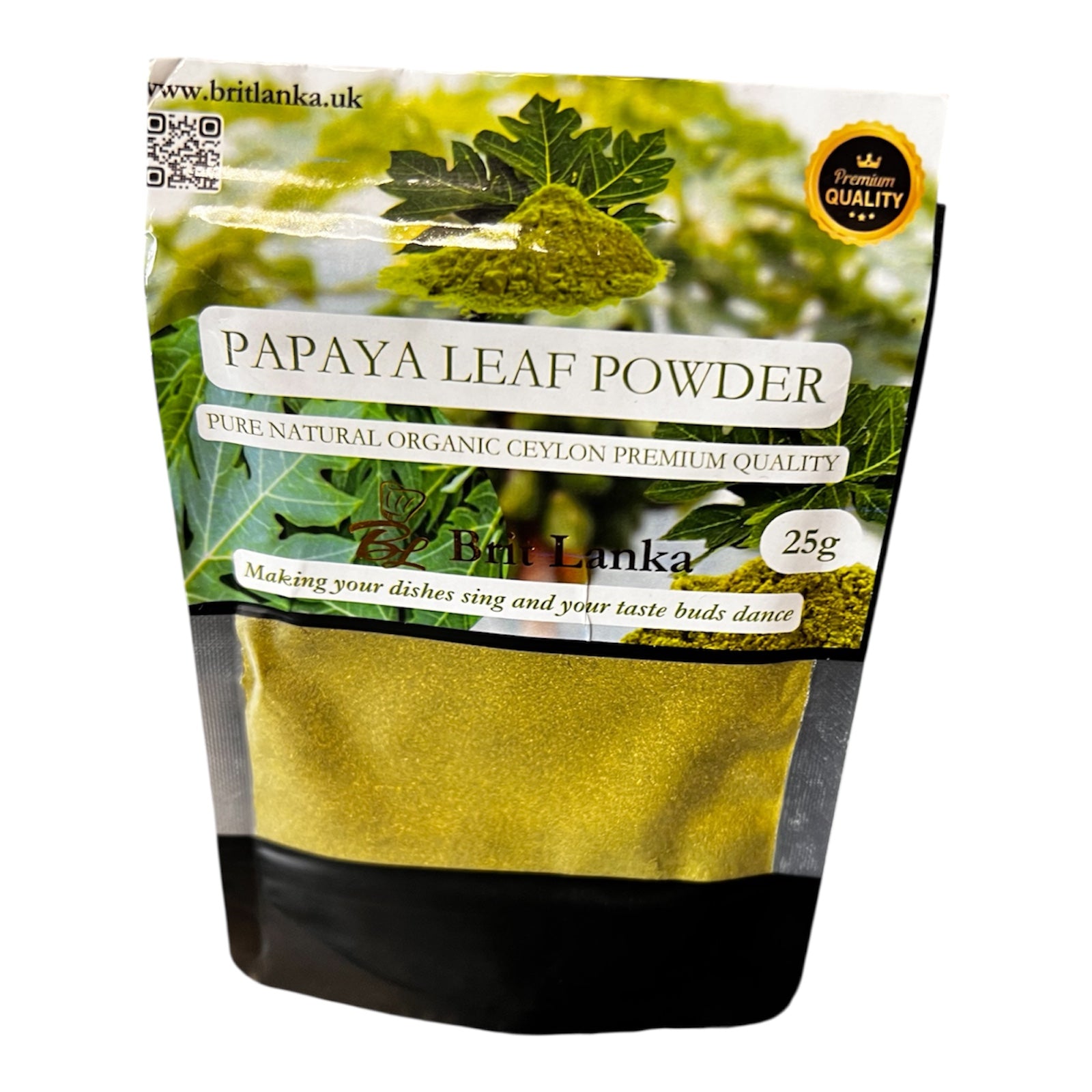 Papaya leaf powder packaging with green leaves on a white background